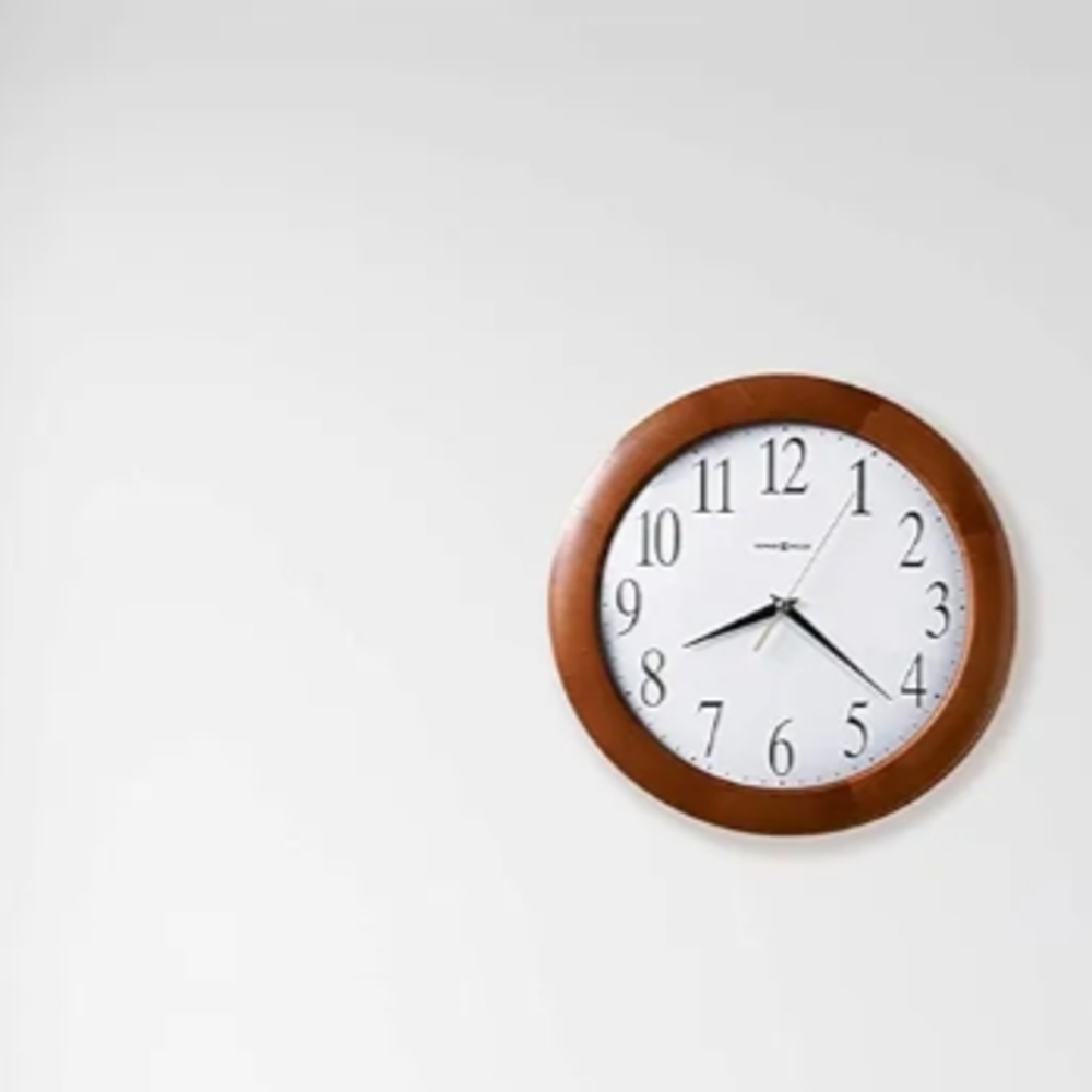 Stylish Wooden Frame Howard Miller Wall Clock